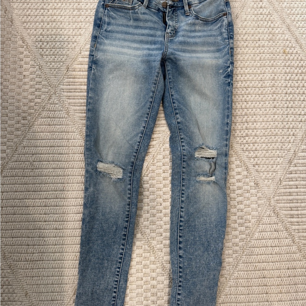 Buckle Light Blue Distressed Skinny Jeans